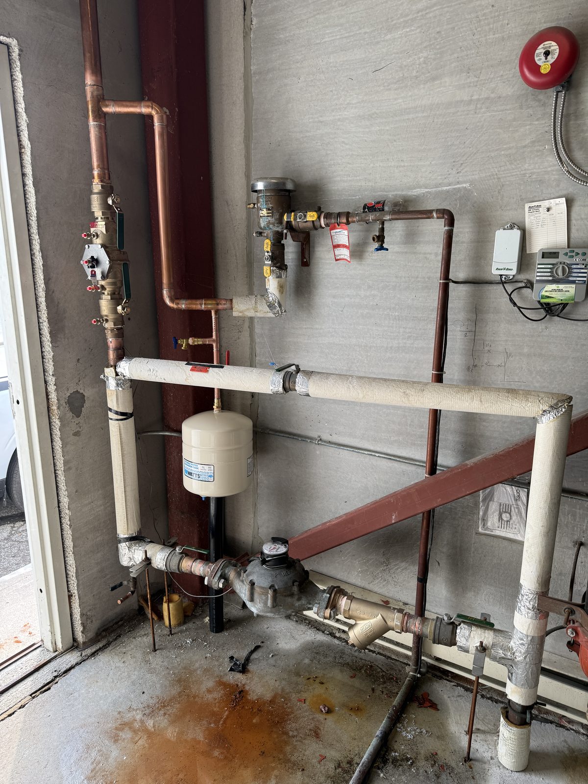 A new double check valve assembly on a copper riser