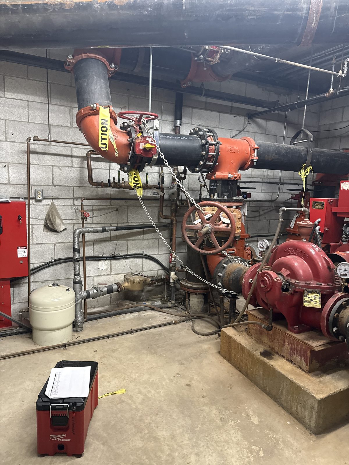 A fire pump room with its backflow assemblies, during a survey