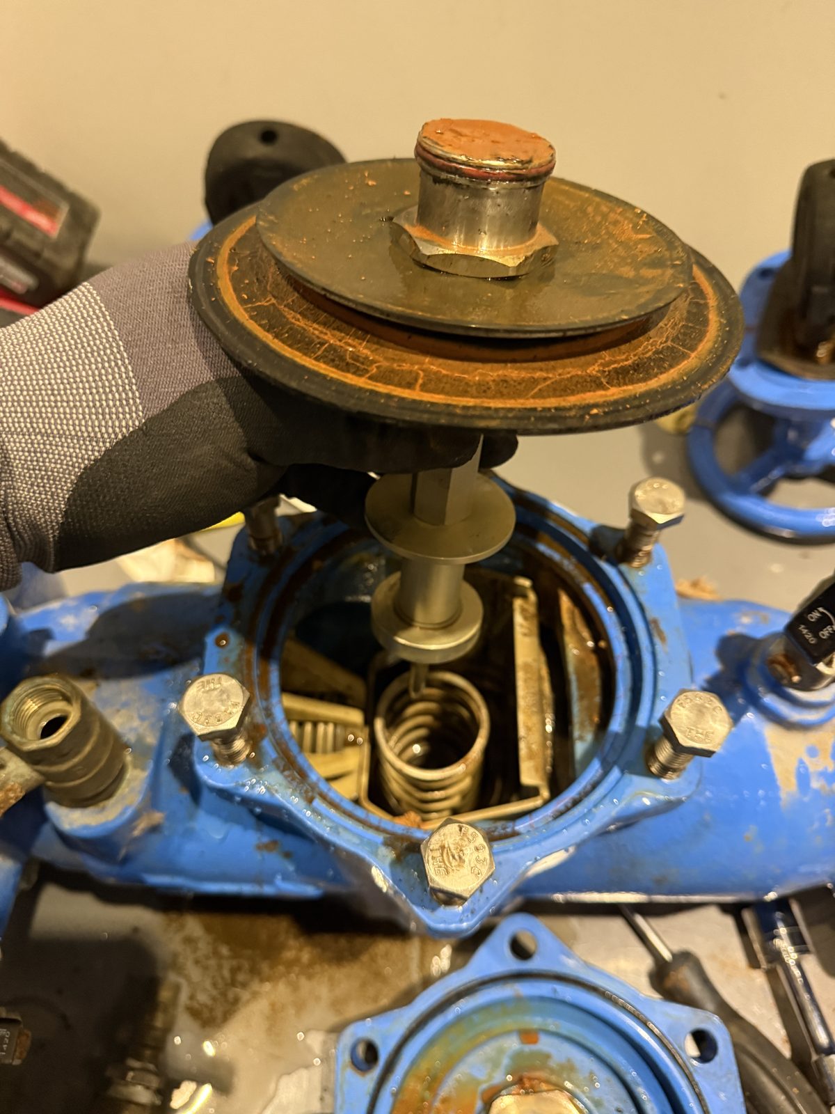 An RPZ with its relief valve cover removed for repair