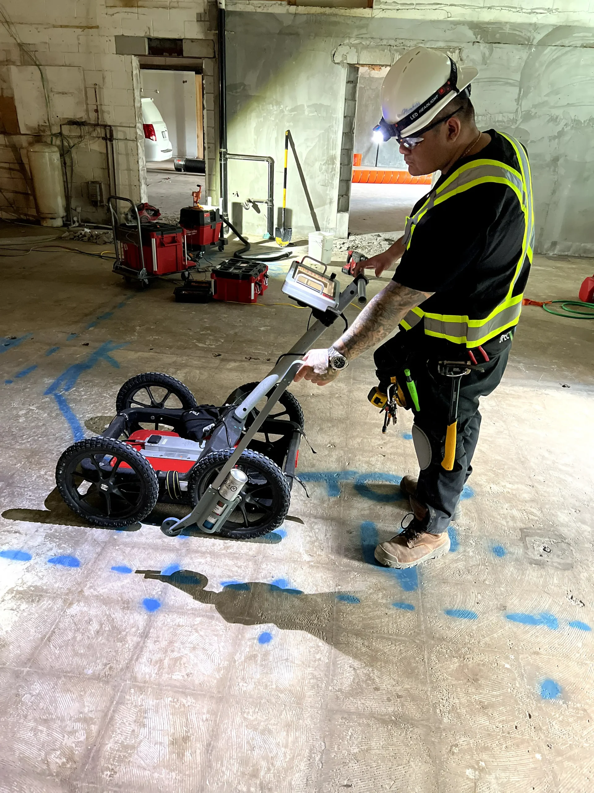 Spec-Mark employee using GPR Scanner