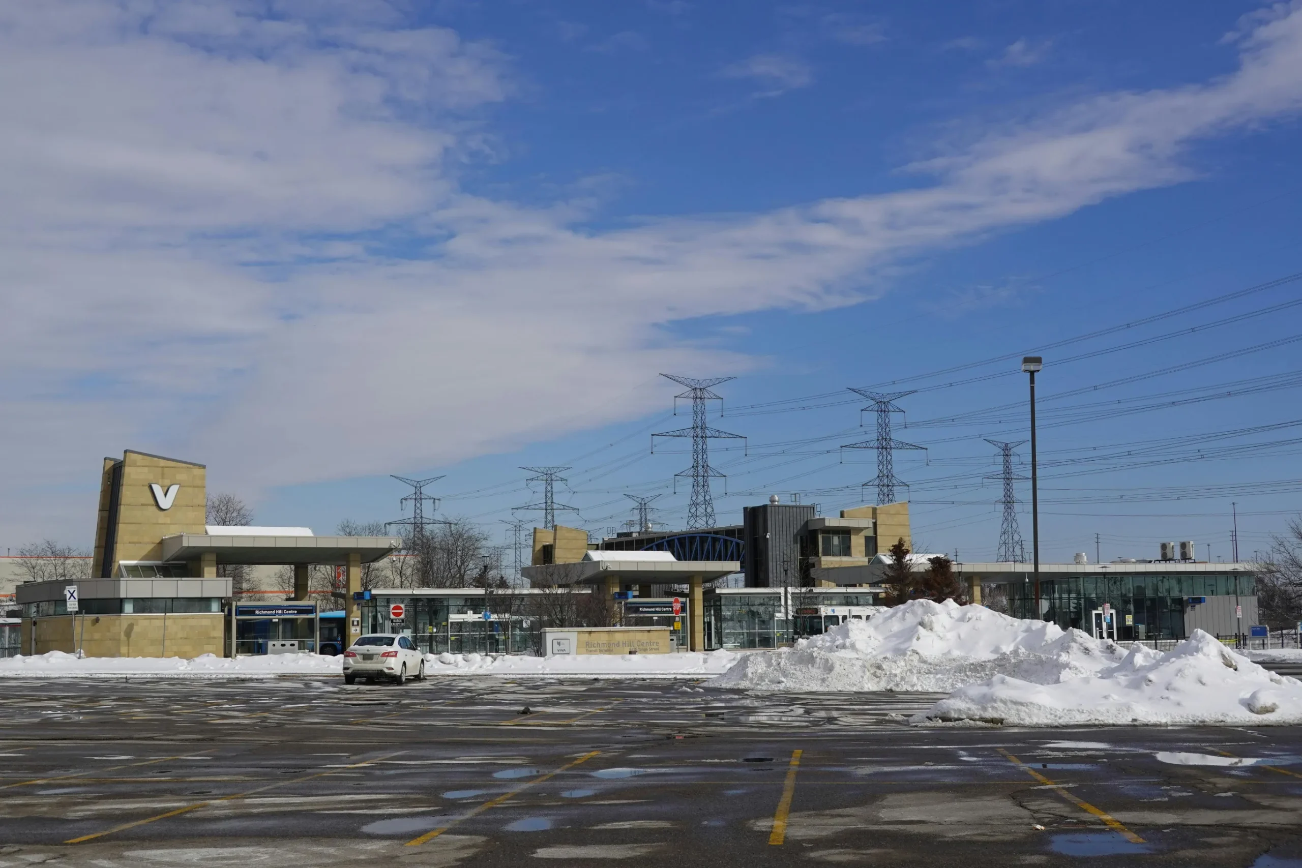 Richmond Hill Centre transit station in winter with snow-covered parking lot and blue sky. Backflow prevention Richmond Hill is paramount to preventing health outbreaks in any municipality.
